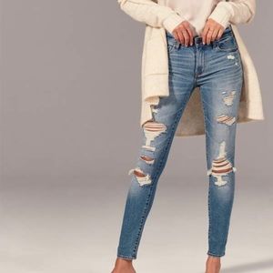 Ripped Mid Rise Super Skinny Jeans